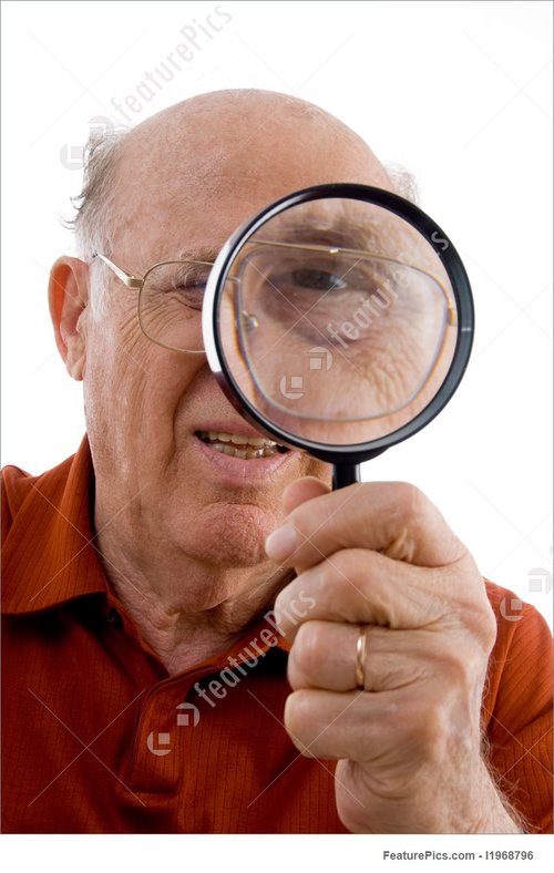 man-looking-through-lens-stock-photo-968796.jpg