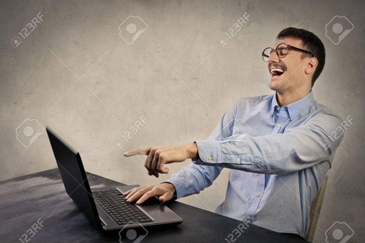 59926886-laughing-in-front-of-the-pc.jpg 59926886-laughing-in-front-of-the-pc.jpg
