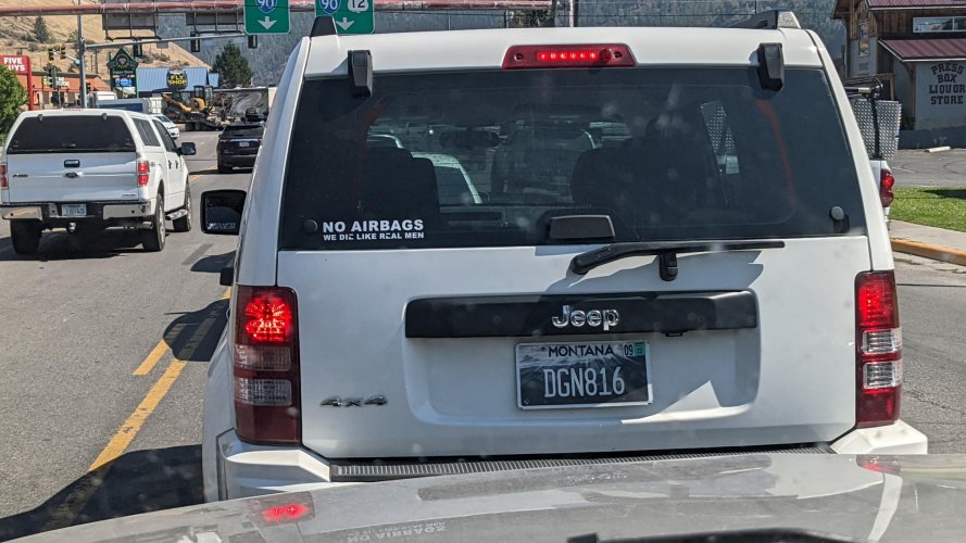 extra stupid window sticker.jpg