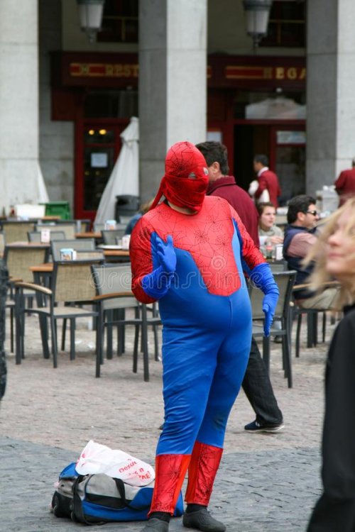 spiderman-costume-showman-disguised-as-well-known-spider-man-blue-red-passers-153475114.jpg