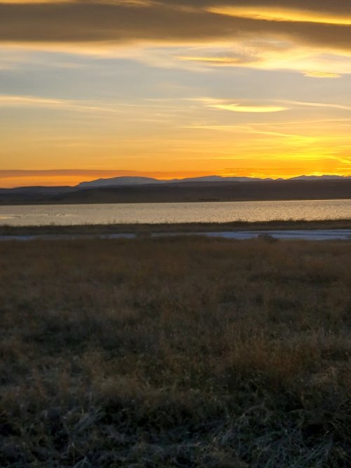 Sunset at Freezeout, Rocky Mountain Front backdrop.jpg