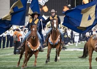 Rafe rides for Bobcat Football.jpg Rafe rides for Bobcat Football.jpg
