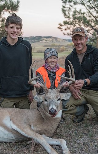 Tyler's buck 2015 with Liv.JPG