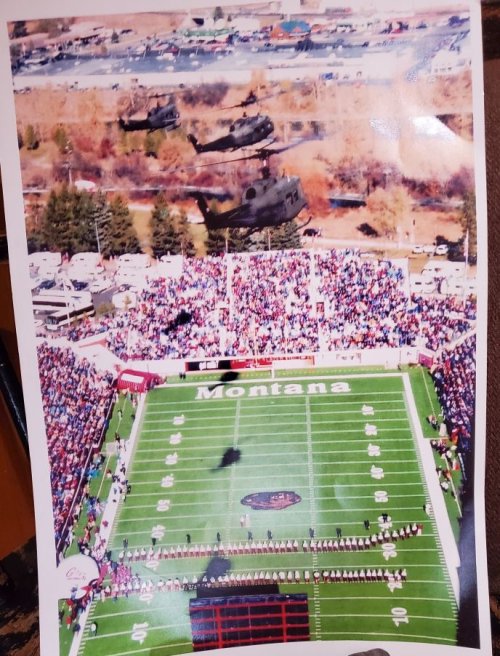 Montana Guard Hueys over Washington Griz Stadium.jpg