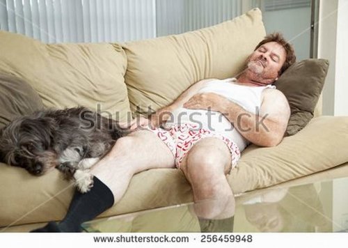 stock-photo-unshaven-middle-aged-man-asleep-on-the-couch-with-his-dog-256459948.jpg