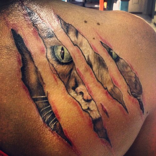 Ripped-Skin-Leopard-Scratches-Tattoo-On-Right-Back-Shoulder.jpg
