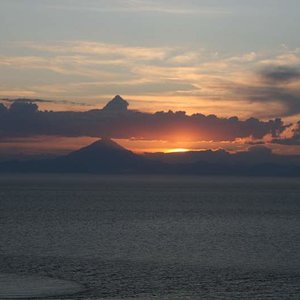 Mt. Redoubt with steam plume at sunset