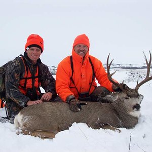 Me and my dad with his 2009 ND Mule Deer