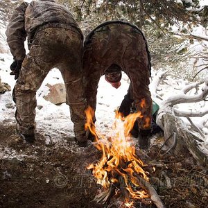 warming up at 12,000 feet in a blizzard....you do what you have to do sometimes.  In Randy's defense he is not in this shot....Cramer, the other camer