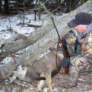 My Alberta mule deer where he fell. Hunting the foothills of the Rocky Mountain front with Frank Simpson in November, 2007.