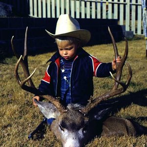 My son, Tyler with a nice buck I took in the Big Belt's in the early 1970's.