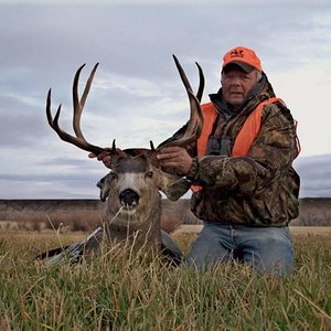 A young Muledeer buck taken in my friend's hayfield.  Meeteetse, Wyoming 2007.  Super eating!