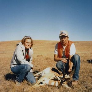 Amy and I with a small buck I shot near Malta in 1989.