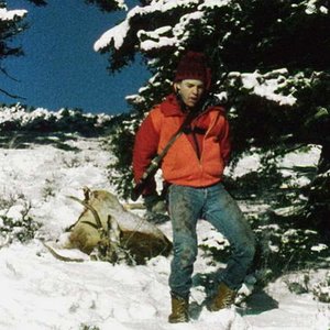 Tyler, dragging out his first elk in 1985.