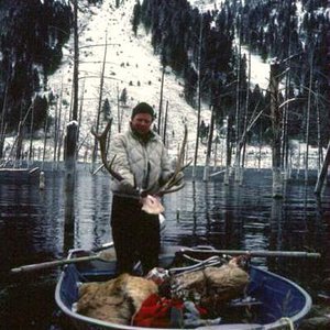 Packing out the bull I took near Quake Lake with my 338-win mag in 1989.