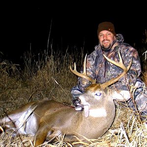 I took my buddy Keith hunting at one of my spots, he called in the 8 point.  He wanted me to shoot it, but the deer busted me and walked right in fron