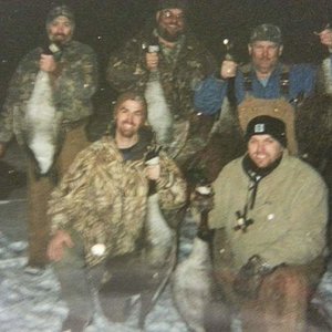 Dad (far left top) his 2 friends and Wes and I on a late season goose night.
