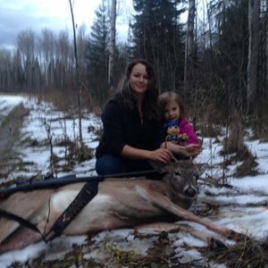 My little whitetail I got while we were out grouse hunting with the midget. This little girl is turning out to be my good luck charm, taken with the R