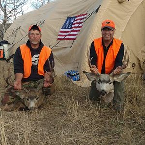 My uncle and cousins first Mule deer