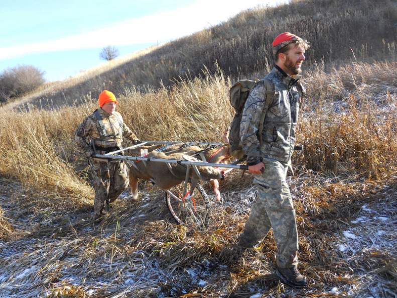 Brother and sister in law carting out their extra doe's they harvested.