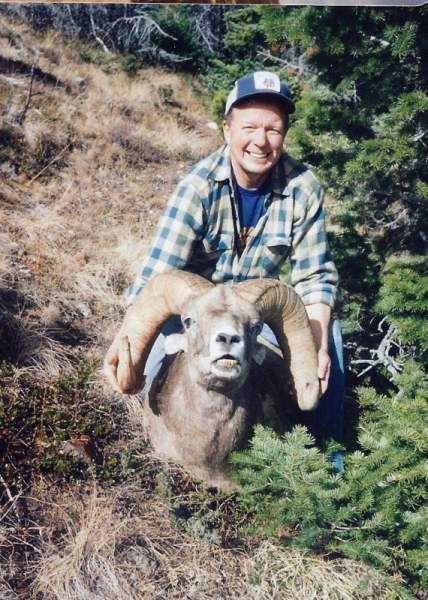 Here I am showing off Paul's ram.  Check out the drop on these horns.  I think the long one was close to 38&quot; broomed.
