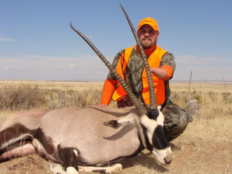 I took this bull on 3/21/09 on the Stallion Range of the WSMR near Socorro, NM. I hunted with Compass West Outfitters. The long horn taped out at 37.5
