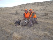 Me and my brother-in-law with my mule deer buck