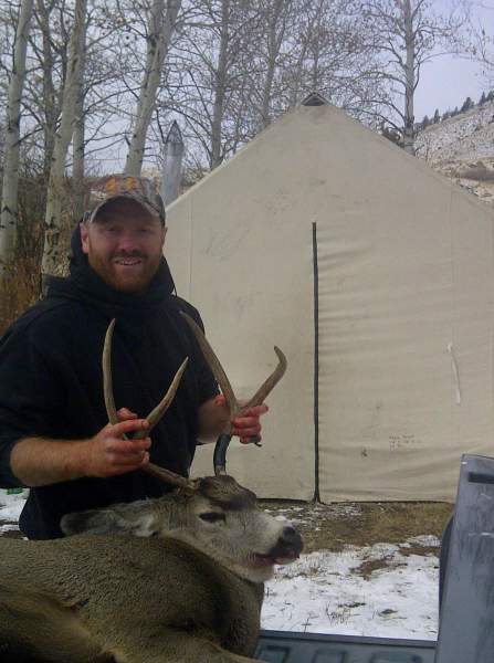 Me and my buck back at camp.