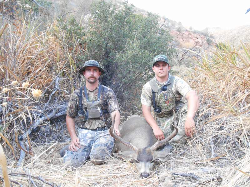 My hunting partners buck we harvested on a backpack hunt in a local wilderness area. He is on the left and I am on the right.