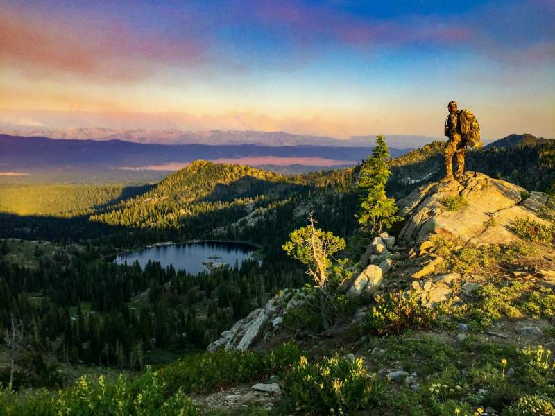 My husband looking over a mountain lake.