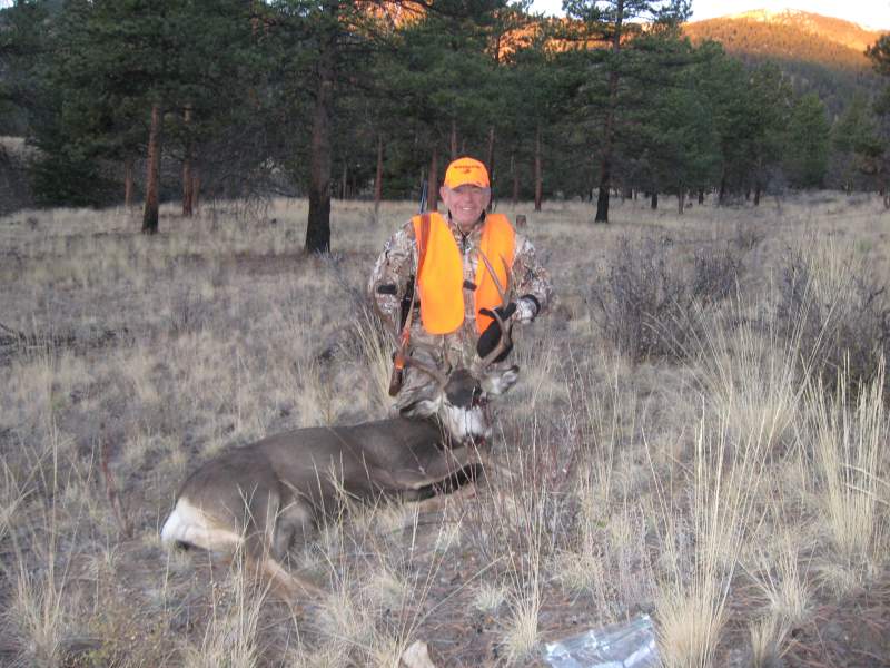 My old hunting buddy with the last successful hunt he had before he passed away in 2013. It was my honor to help him bag this Muley.