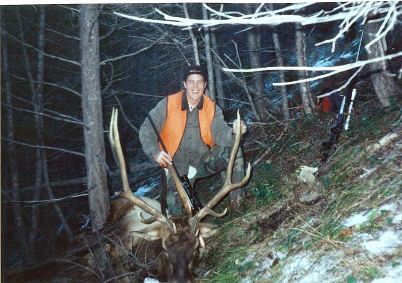 My son, Tyler with the bull he and his brother-in-law shot.