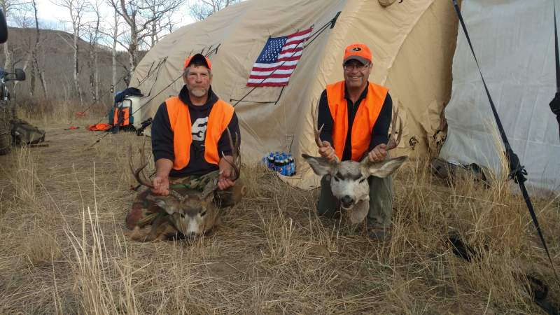 My uncle and cousins first Mule deer