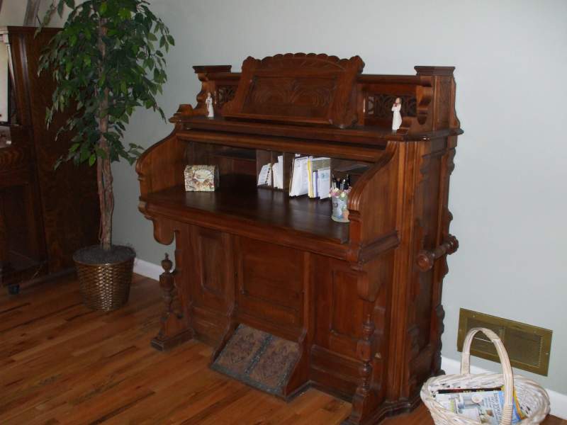 Old antique pump organ case given to me by my FIL. Worked it over for 6 month and turned it into a desk