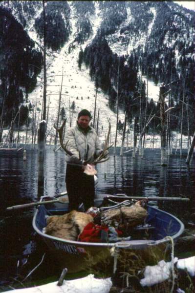 Packing out the bull I took near Quake Lake with my 338-win mag in 1989.