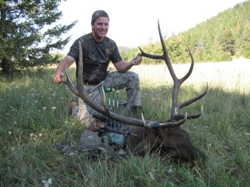 Tyler with his archery bull taken September 3, 2009.