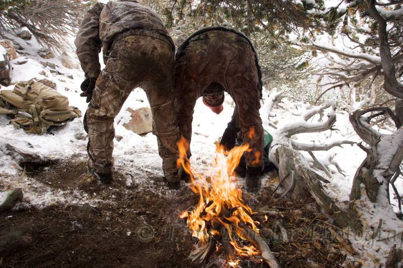 warming up at 12,000 feet in a blizzard....you do what you have to do sometimes.  In Randy's defense he is not in this shot....Cramer, the other camer